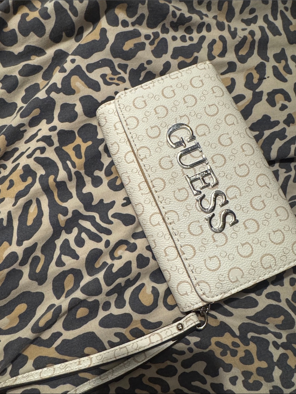 GUESS Cream Logo-Print Wristlet Clutch with Silver Hardware